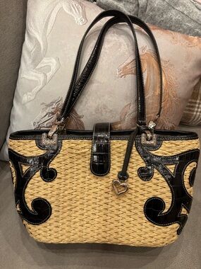 Brighton woven straw handbag with black leather trim and signature heart